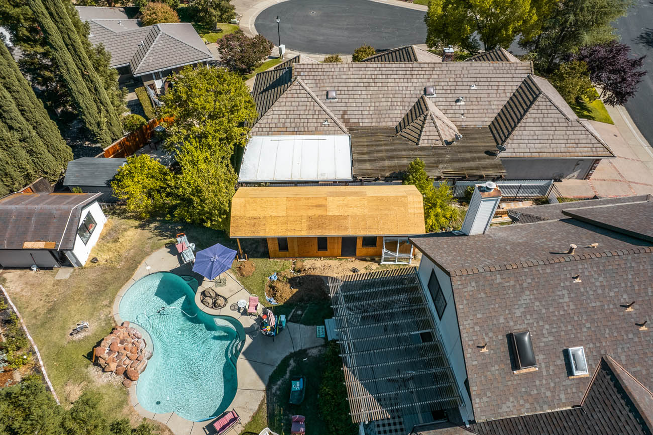 An ADU being built next to a pool by a expert pool house builder in San Jose, CA at Anchored Tiny Homes.